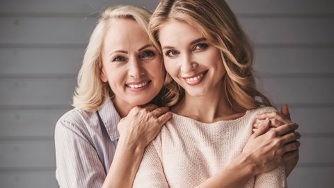 A mother and daughter smile, supported by family dentistry care across generations at La Costa Dental Excellence in Carlsbad, CA